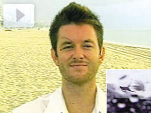 美国小伙冲浪突遇风暴 被风筝拽着撞上大楼