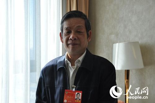 十二届全国政协常务委员、民进中央常委、广西壮族自治区委主委陈自力